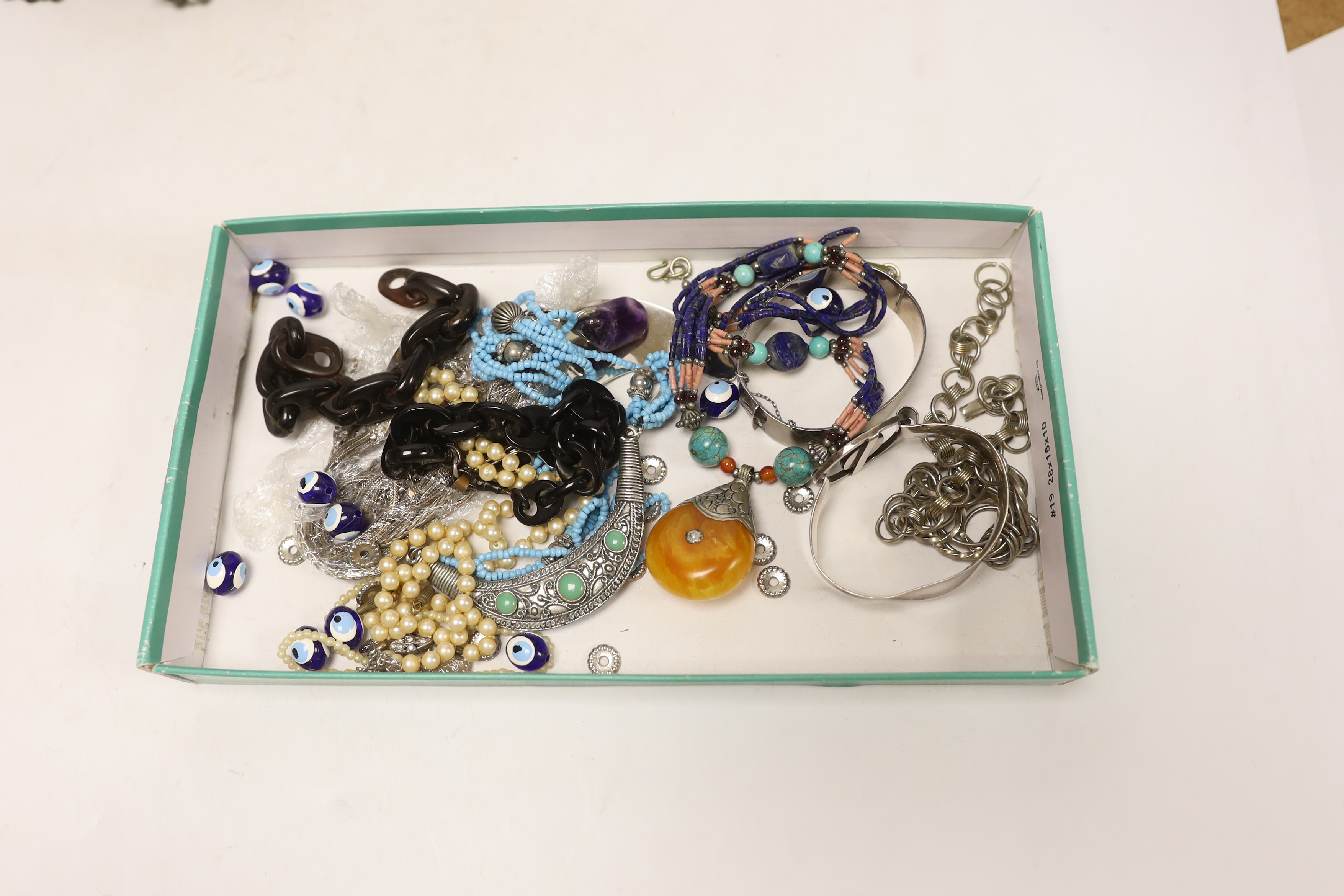 A quantity of assorted costume jewellery, including chains and bangles, etc.